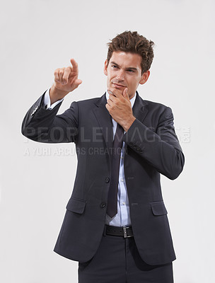 Buy stock photo Technology, thinking or businessman on touchscreen in virtual reality studio on white background for metaverse. Confused, future or software system login access with finger pointing, doubt and update