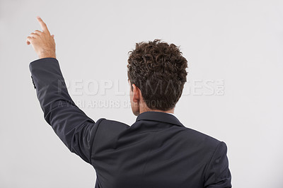 Buy stock photo Business, man and touching a digital interface in studio on white background for company research and ideas. Back view, male person and click for user experience with technology and innovation