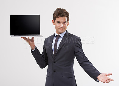 Buy stock photo Portrait, screen and man holding a laptop, presentation or connection on white studio background. Face, employee or model with tech, internet or computer with email, showing and digital app with info