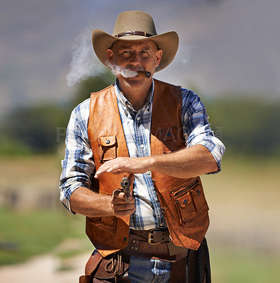 Buy stock photo Cowboy, portrait and aim gun to shoot for standoff or gunfight in duel for wild western culture in Texas. Male gunslinger or outlaw, revolver and confrontation for defense or conflict with battle