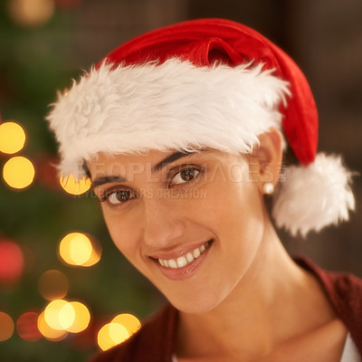 Buy stock photo Portrait of an attractive young woman in front of a Christmas tree