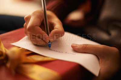 Buy stock photo Closeup shot of a woman writing a christmas letter