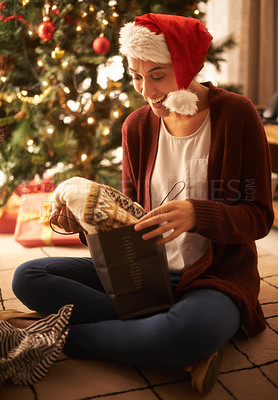 Buy stock photo A young woman at home at Christmas time