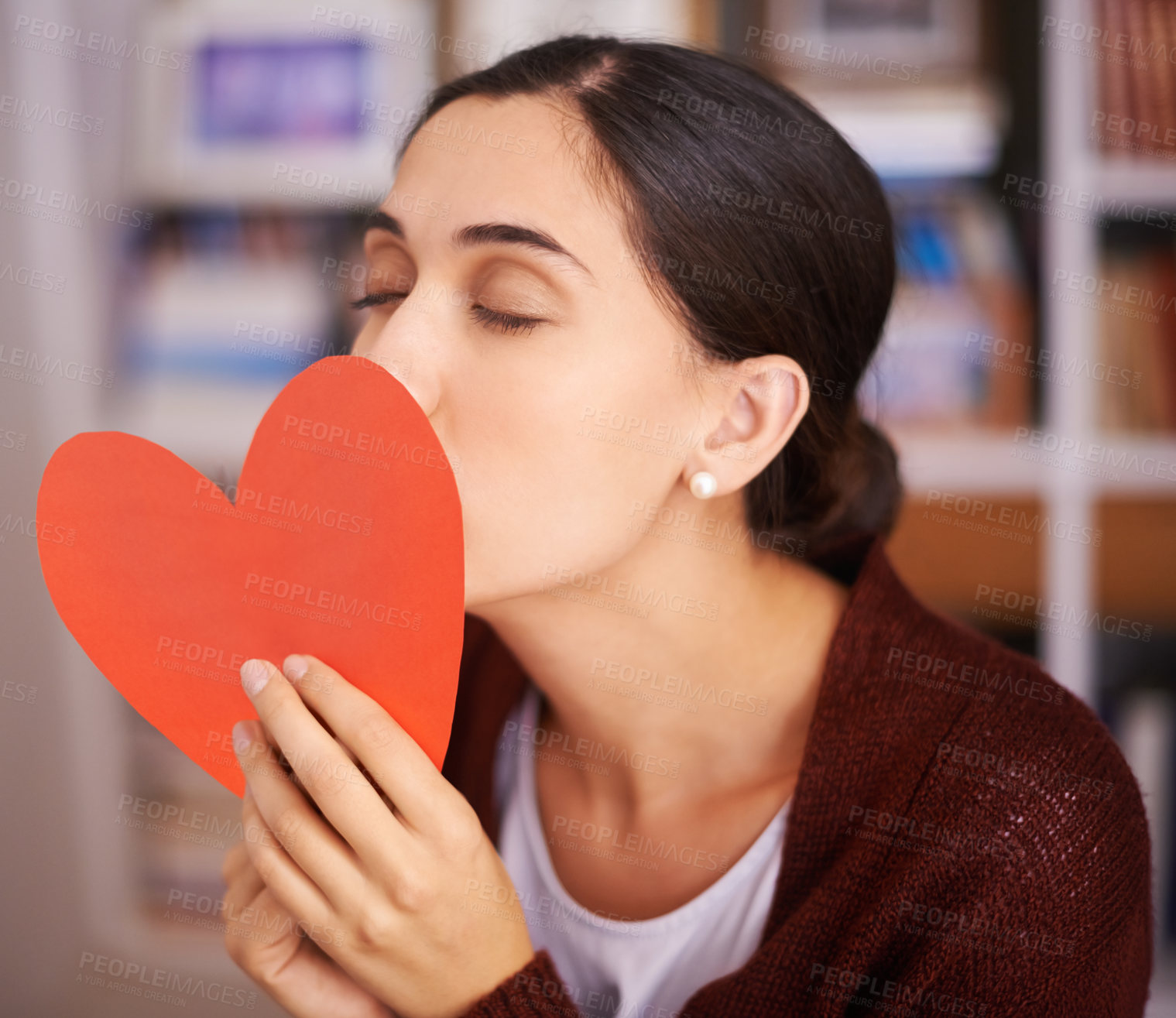 Buy stock photo Woman, kiss and heart card in home for valentines day, memory and happy for celebration with sign. Girl, person and love letter for romance, kindness and notes for relationship with care in apartment