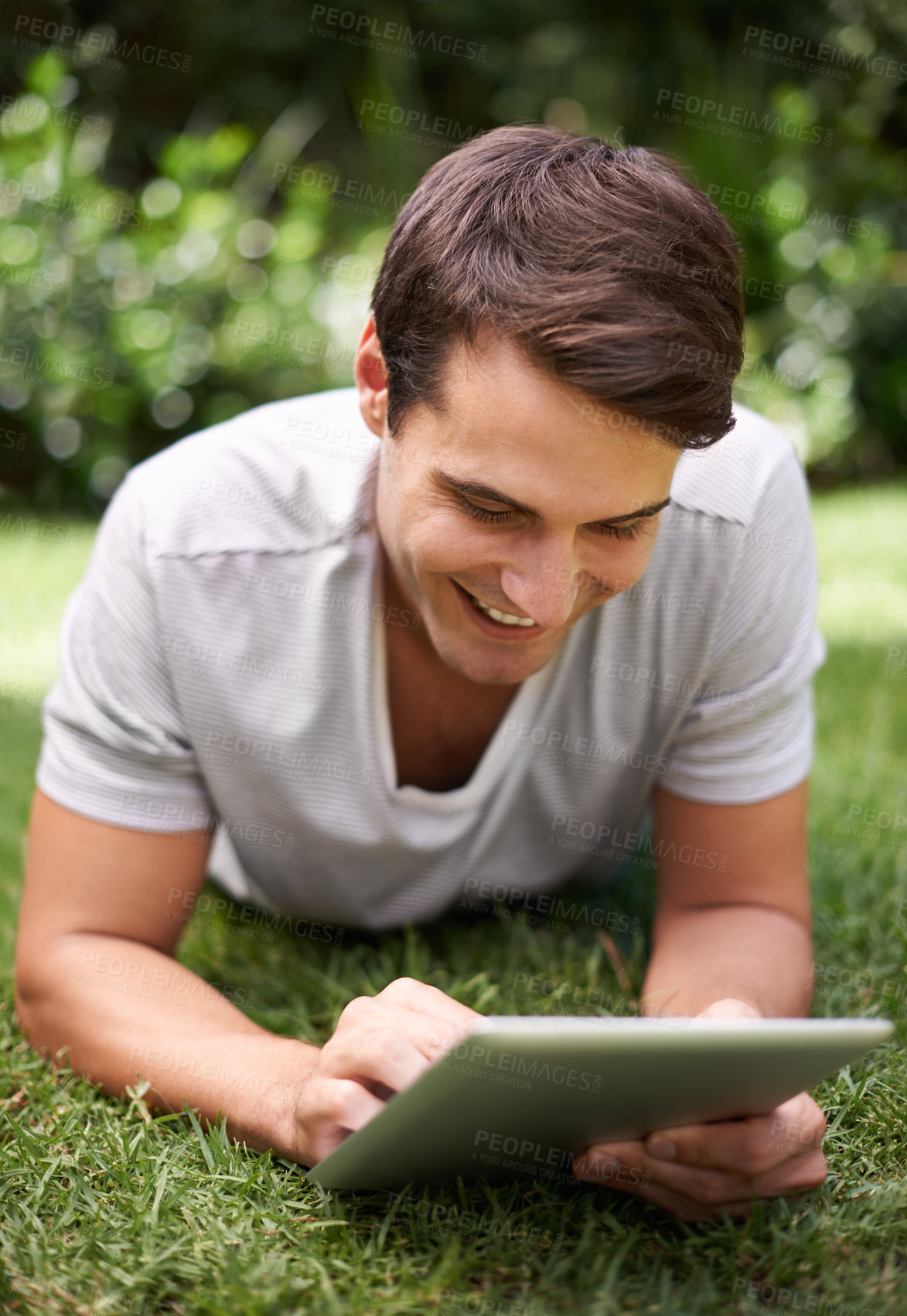 Buy stock photo Man, tablet and backyard reading or relax connection or browsing social media on weekend, subscription or online. Male person, garden and nature rest for web entertainment, researching or internet