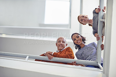 Buy stock photo Business people, colleagues and bottom view with smile, man and women looking at stairs. Professional team, diversity or group and standing together for break and conversation in workplace or office