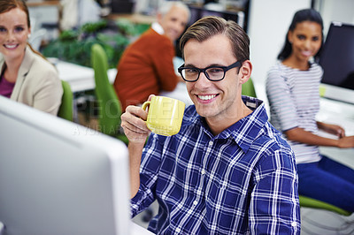 Buy stock photo Man, smile and desk with coffee on computer in office, digital design for online research for business website. Colleague, career and employees for creative company, typing or browse on internet