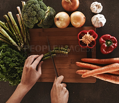 Buy stock photo Person, hands and knife with vegetables, chopping board and food with ingredients and wellness. Closeup, utensils and chef with salad and lunch with diet plan and healthy meal with dinner and home