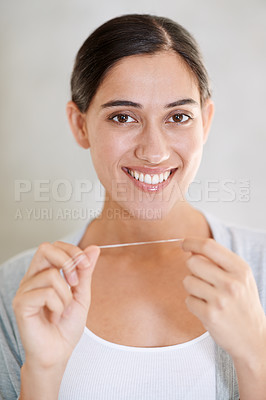 Buy stock photo Woman, portrait and smile with dental floss in home for health, wellness or care for teeth in morning. Girl, person and happy with string for oral, mouth or cleaning for hygiene at apartment in Chile