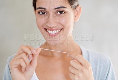Buy stock photo Woman, portrait and happy with dental floss in home for health, wellness or care for teeth in morning. Girl, person and smile with string for oral, mouth or cleaning for hygiene at apartment in Chile