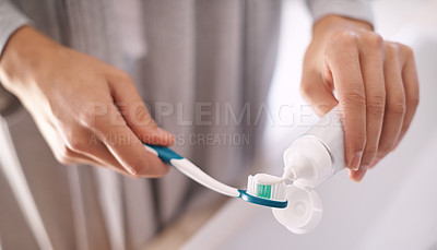 Buy stock photo Portrait of an attractive young woman brushing her teeth