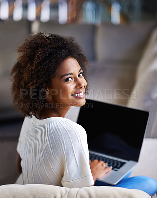 Buy stock photo Portrait, smile and woman on a couch, laptop and connection for social media, happiness and relax at home. Face, female person and happy girl on a sofa, technology and search website for information