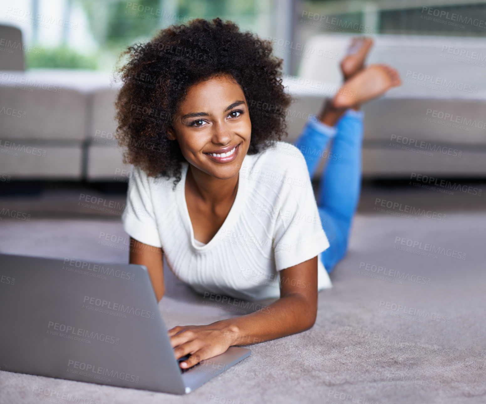 Buy stock photo Carpet, laptop and portrait of woman on floor working on freelance creative project in living room. Happy, technology and African female designer typing on computer for research on rug in apartment.