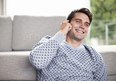 Buy stock photo Smile, phone call and man in home living room for conversation, chat or listening to contact. Smartphone, talking and happy person in lounge for communication, news or network for connection in house