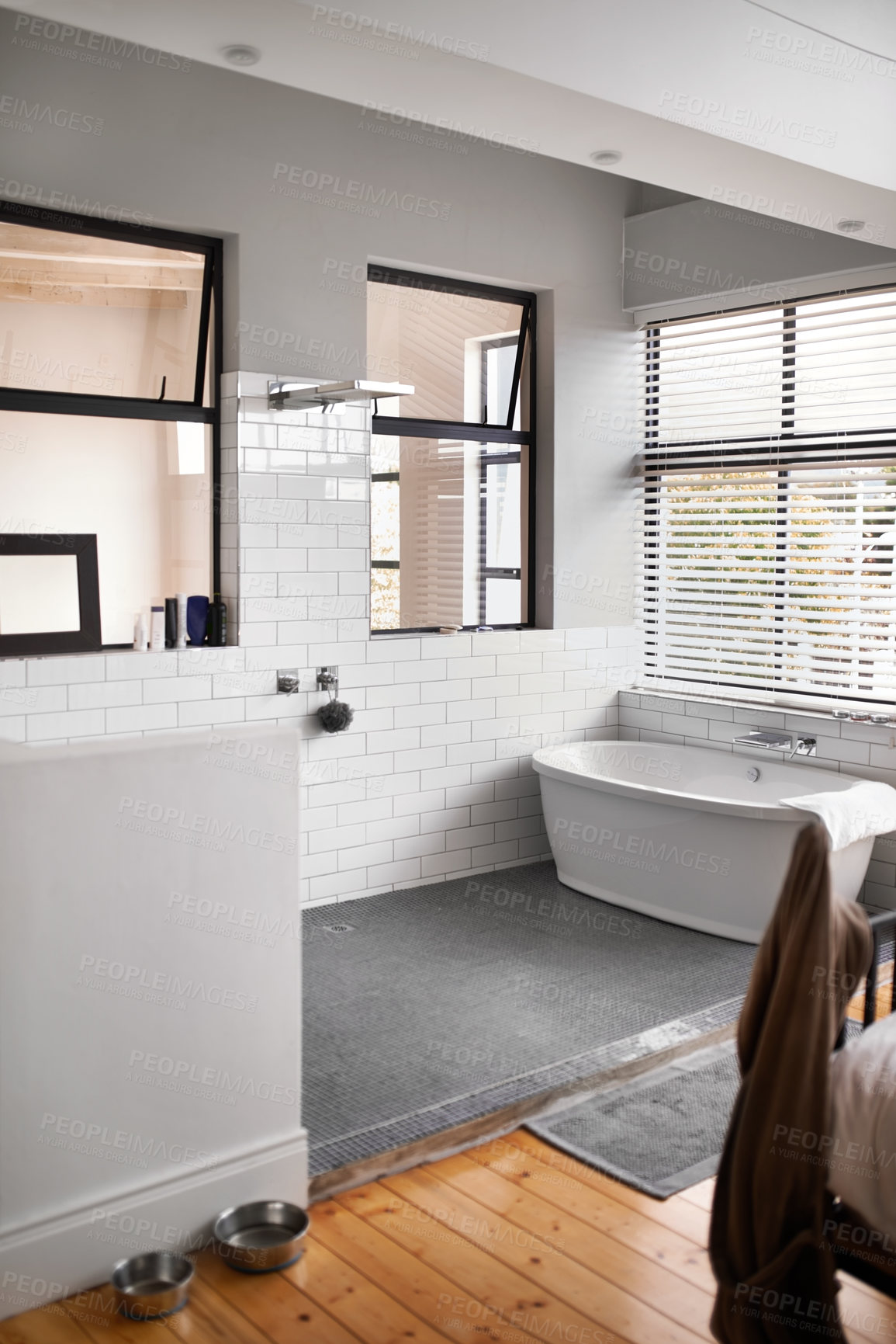 Buy stock photo Shot of a modern bathroom with luxurious amenities