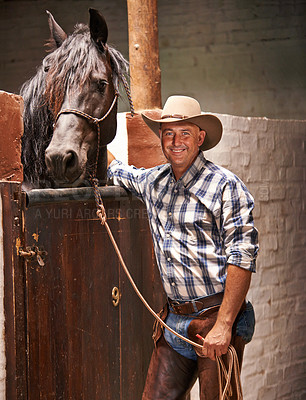Buy stock photo Cowboy, man and horse by gate for portrait with care, growth and development with smile, ranch and countryside. Person, animal or pet with love, connection and bonding for wellness at stable in Texas