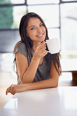 Buy stock photo Portrait, tea and relax with woman in kitchen of home to relax in morning or on weekend time off. Face, smile and mug with happy young person drinking coffee in apartment for peace or wellness