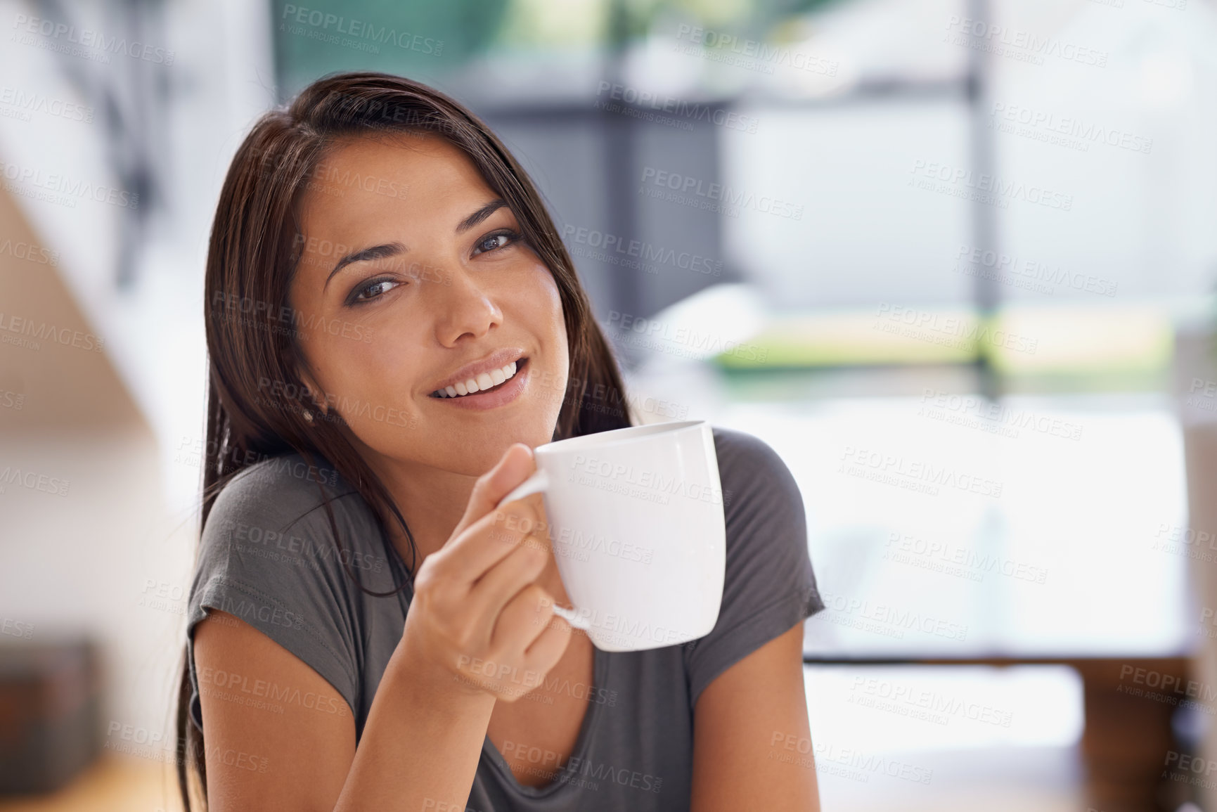 Buy stock photo Portrait, coffee and relax with woman in kitchen of home to relax in morning or on weekend time off. Face, smile and mug with happy young person drinking tea in apartment for peace or wellness