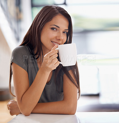 Buy stock photo Portrait, coffee and happy with woman in kitchen of home to relax in morning or on weekend time off. Smile, relax and mug with face of young person drinking tea in apartment for peace or wellness