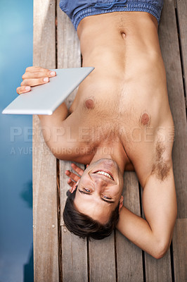 Buy stock photo Happy man, tablet and portrait by swimming pool for summer holiday, top view and face outdoor. Water, technology or person on vacation with social media app, networking or streaming on internet above