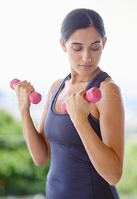 Buy stock photo Woman, face and dumbbell with weightlifting for fitness in nature with strength, wellness and healthy body. Athlete, person and training equipment for exercise, workout or physical activity for arms