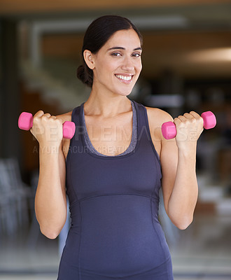 Buy stock photo Woman, portrait and dumbbell with weightlifting for fitness in gym with happiness, wellness or healthy body. Athlete, person and training equipment for exercise, workout or physical activity for arms