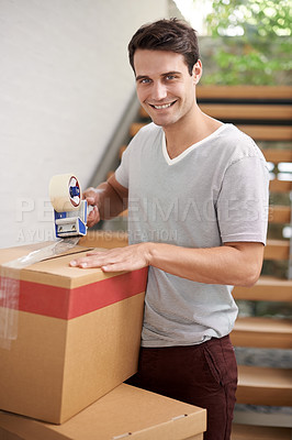 Buy stock photo Man, portrait and boxes in home for moving with investment in real estate, new house pr relax with happiness. Person, face or smile with tape on cardboard for storage, cargo or package for relocating