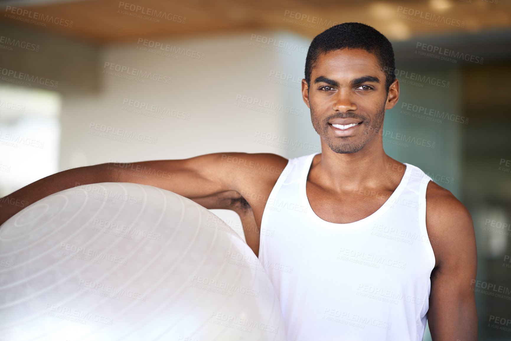 Buy stock photo Black man, smile and portrait with fitness ball for pilates, cardio exercise or balance training. African person, gym equipment and face with happiness for workout, performance goals and healthy body