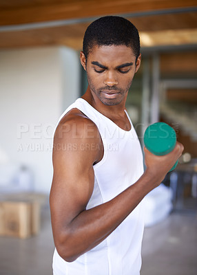 Buy stock photo Black man, fitness and training with dumbbell for workout, bodybuilding and healthy body in home. Exercise, active and African person with equipment in house for lifting weights, wellness or strength