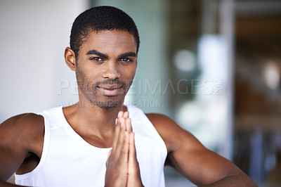 Buy stock photo Man, portrait and meditation in home for fitness, wellness or diet on blurred background for exercise and namaste. African person and trainer with smile and hands together for zen, calm and peace