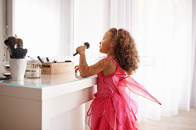 Buy stock photo Child, brush and mirror with makeup for skincare, beauty or happiness with cosmetics or smile. Girl, grooming and reflection of a young kid in with foundation, space or blusher in the home or house