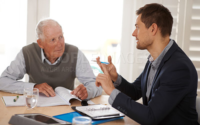 Buy stock photo Financial advisor talking to a senior man with an investment, savings or retirement planning. Discussion, documents and professional accountant helping an elderly male person with finance paperwork.