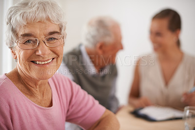 Buy stock photo Senior, woman and happiness portrait in home with financial advisor for retirement planning or life insurance by table. Elderly, people and face with consultant for title deed and pension agreement
