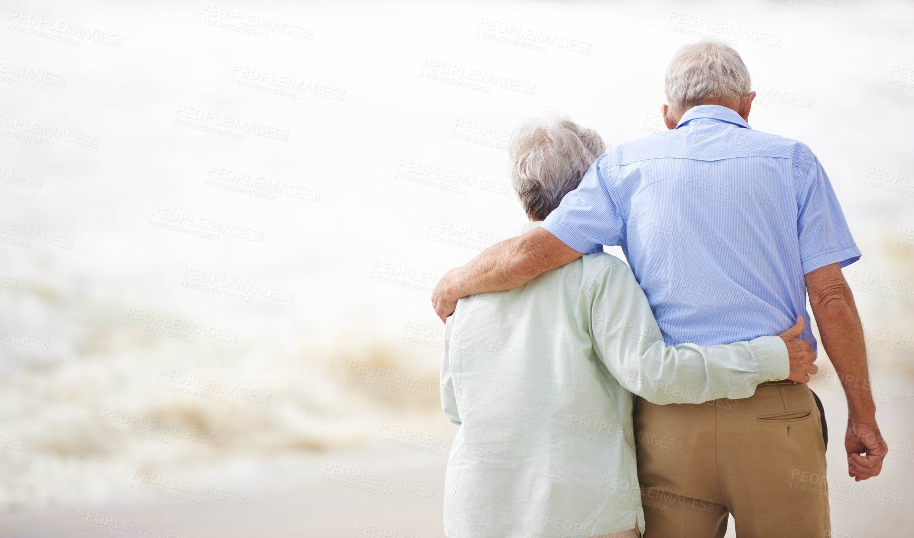Buy stock photo Shot of an elderly couple on the beach