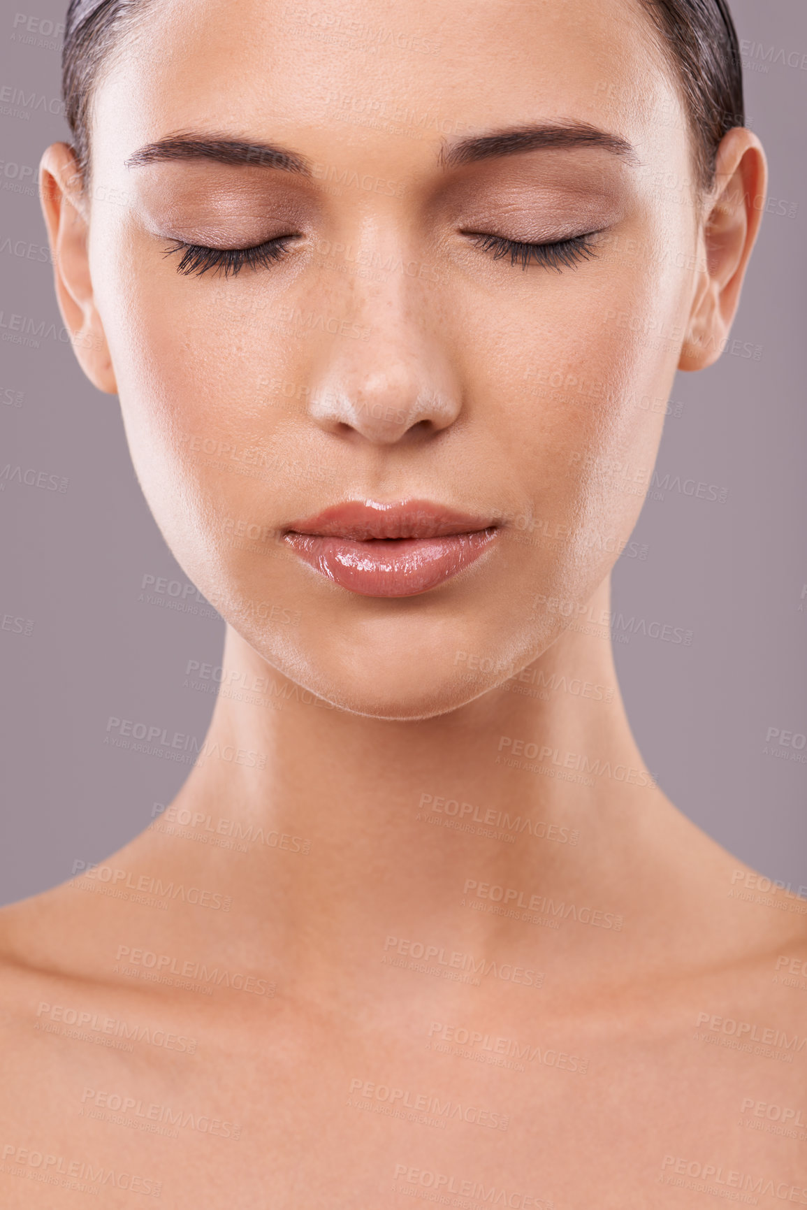 Buy stock photo Woman, glow and makeup for skincare, beauty and cosmetology in facial, health and model. Female person, lip gloss and flawless skin for dermatology and cosmetics in studio on grey background