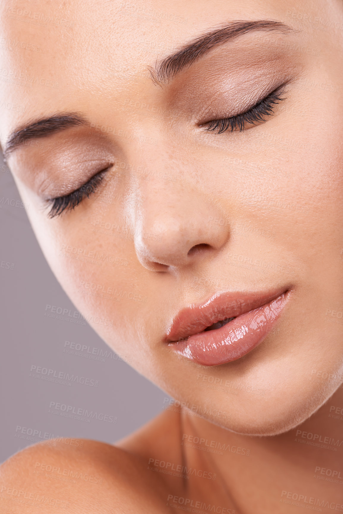 Buy stock photo Woman, studio and thinking with dreaming, cosmetics and gloss for makeup and glamour appeal in face zoom. Female person, eyebrow and micro blading for lipstick, foundation and grey background beauty