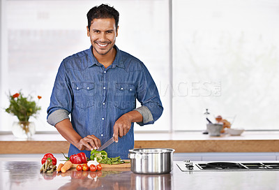 Buy stock photo Cooking, portrait and happy man cutting vegetables on kitchen counter for healthy diet, nutrition or lunch. Chopping board, food and face of person preparing fresh salad for organic meal prep in home