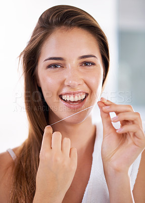 Buy stock photo Happy, dental and portrait of woman with floss for health, wellness and clean routine for hygiene. Oral care, smile and female person with dentistry tool for teeth or mouth treatment in bathroom.