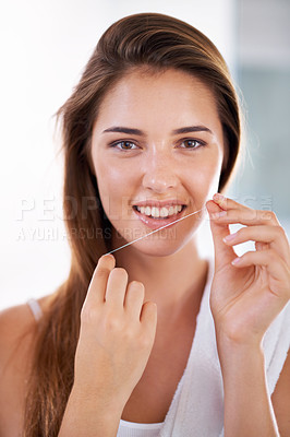 Buy stock photo Smile, oral care and portrait of woman with floss for health, wellness and clean routine for hygiene. Dental, happy and female person with dentistry tool for teeth or mouth treatment in bathroom.