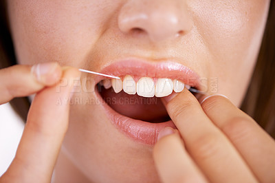Buy stock photo Floss, oral care and closeup of woman teeth with health, wellness and clean routine for hygiene. Dental, grooming and zoom of young female person with dentistry mouth treatment for fresh breath.