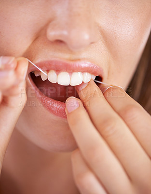 Buy stock photo Floss, dental and closeup of woman teeth with health, wellness and clean routine for hygiene. Oral care, grooming and zoom of female person with dentistry tool for mouth treatment for fresh breath.
