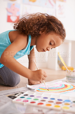 Buy stock photo School, learning or girl painting a rainbow on classroom floor for creative, education or child development. Paper, color splash or cute kid with kindergarten art paint, sketch or having fun drawing