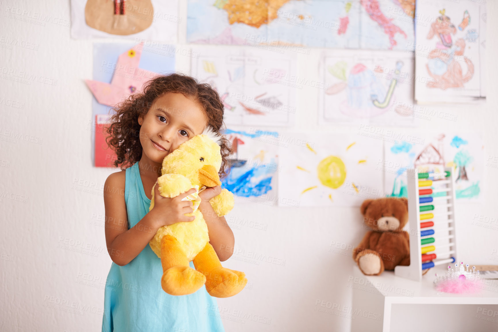 Buy stock photo Girl, portrait and cute with duck to cuddle in bedroom for comfort or playtime, smile and innocent. Child, adorable and hug stuffed animal for youth and happiness with bonding embrace for development