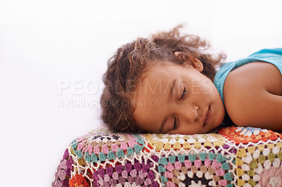 Buy stock photo Child, sleeping and relax on bed in home, dreaming and wellness on quilt blanket for childhood development. Girl, tired or rest in bedroom on summer vacation, peace or comfort for cozy break in house