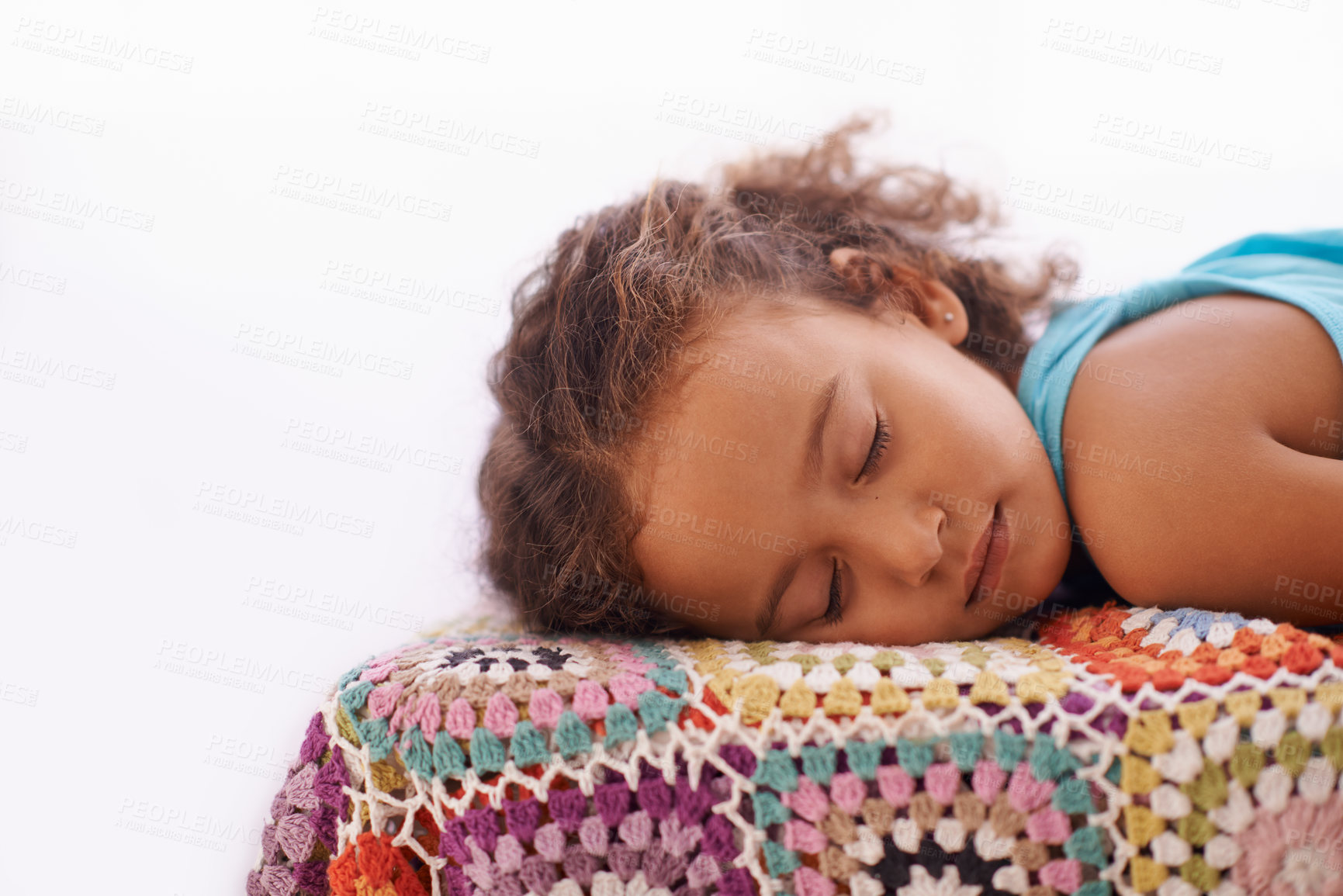 Buy stock photo Child, sleeping and relax on bed in home, dreaming and wellness on quilt blanket for childhood development. Girl, tired or rest in bedroom on summer vacation, peace or comfort for cozy break in house