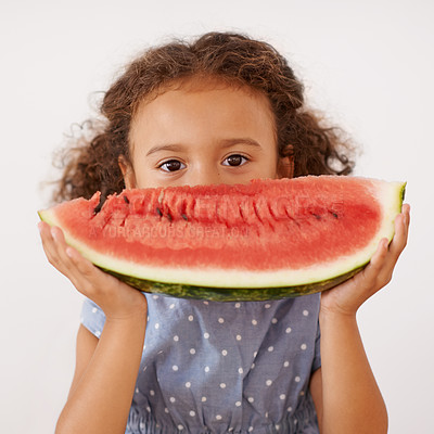 Buy stock photo Portrait, eyes or girl with watermelon in studio for healthy, diet or wellness on grey background. Fruit, hiding or kid model face with gut health, nutrition or organic snack for digestion support
