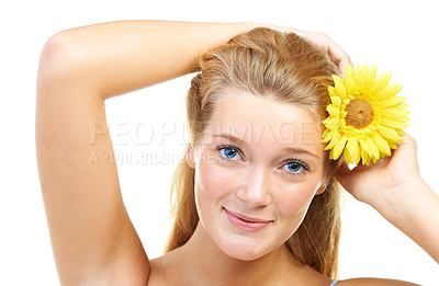 Buy stock photo Skincare, portrait and happy woman in studio with sunflower in her hair for natural cosmetics on white background, Flower, smile or model face with wellness, glowing skin or organic beauty treatment