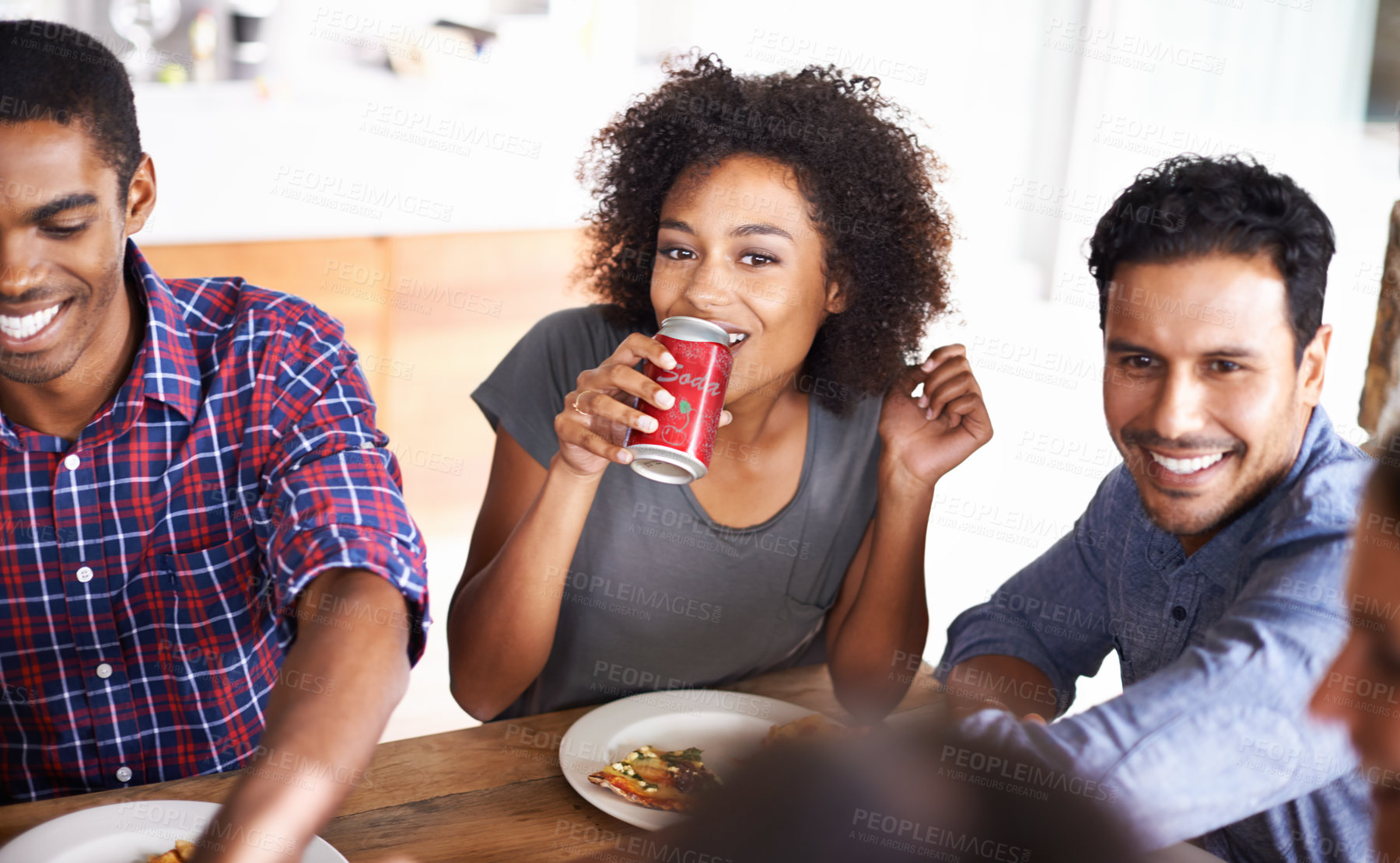 Buy stock photo Cropped shot of a group of friends enjoying pizza together