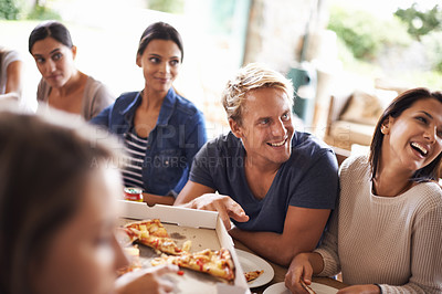 Buy stock photo Friends, group and eating of pizza in home with laughing, soda or social gathering for bonding in dining room. Men, women or fast food with funny joke, drinks or diversity at table in lounge of house