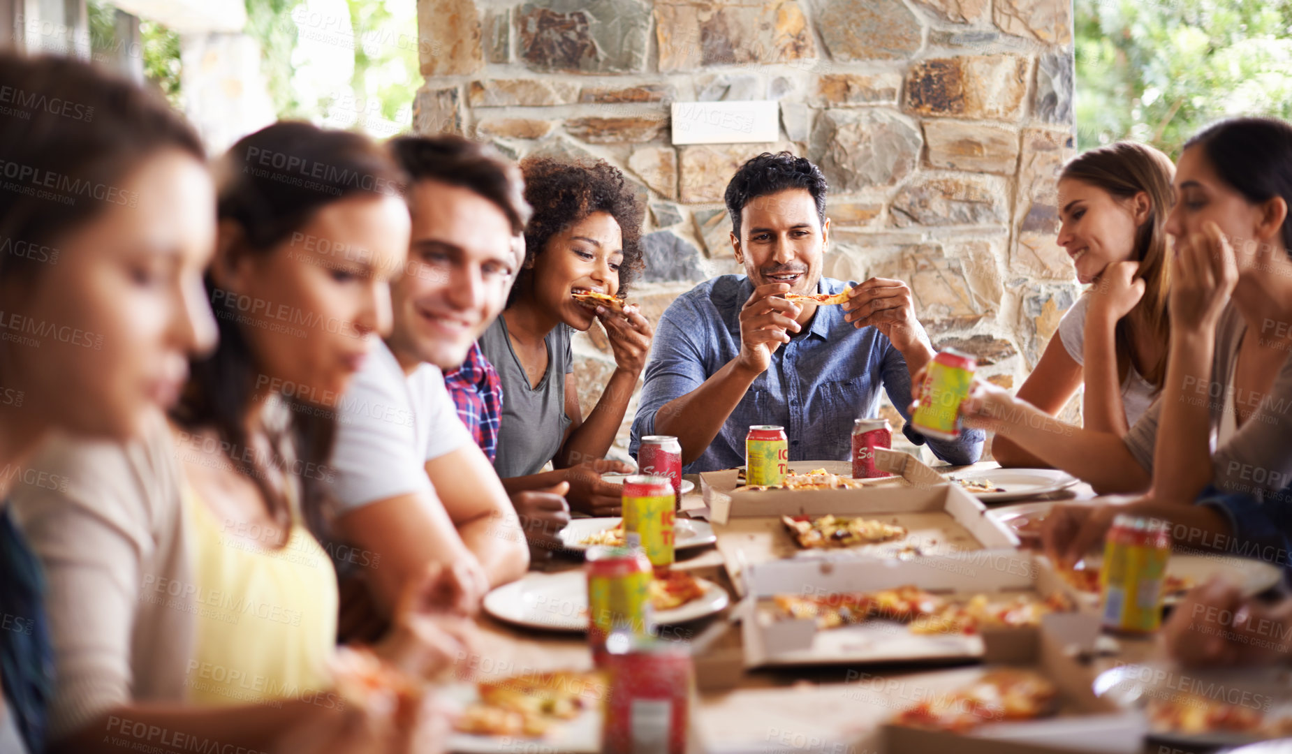 Buy stock photo Friends, group and eating of pizza in home with happiness, soda and social gathering for bonding in dining room. Men, women and fast food with smile, drinks and diversity at table in lounge of house